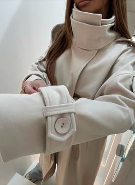 Women’s WICK coat light beige with a high collar and waist tie.