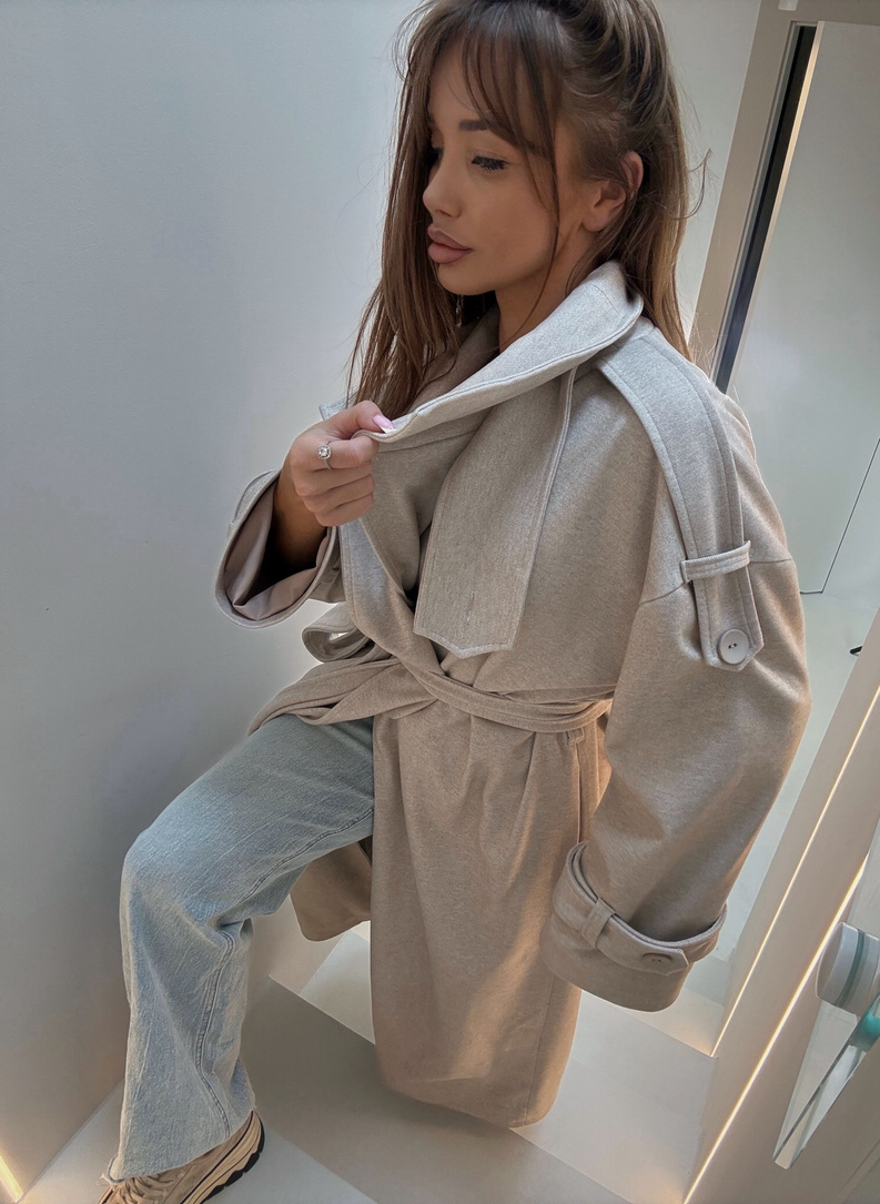 Women’s WICK coat beige melange with a high collar and waist tie.