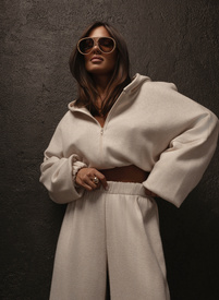 A light beige, solid-color women's set with wool